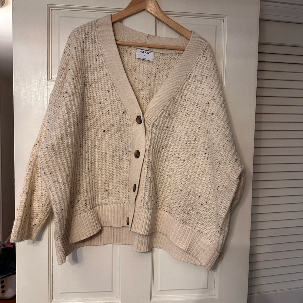 Oversized chunky knit cream sweater.